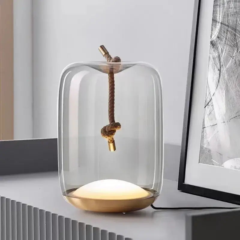 Modern glass knot table lamp with brass base for bedroom decor