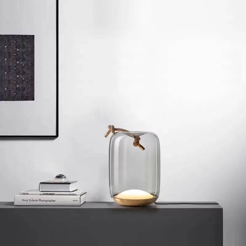 Modern glass knot table lamp with brass base for bedroom decor