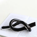 Modern glossy black geometric glass sculpture living room knot decor