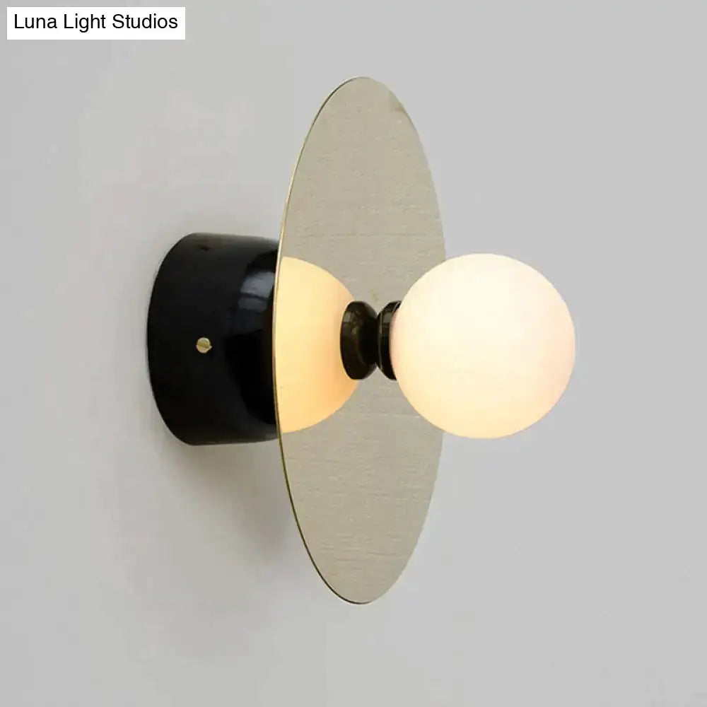 Modern gold and black riya wall light bedroom frosted glass sconce