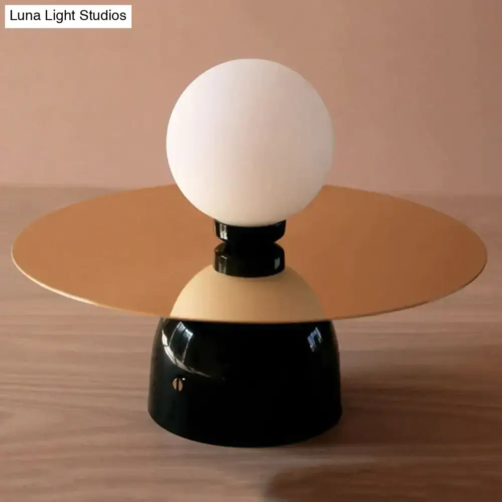 Modern gold and black riya wall light bedroom frosted glass sconce