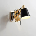 Modern gold and black wall sconce bedroom light with barrel shade