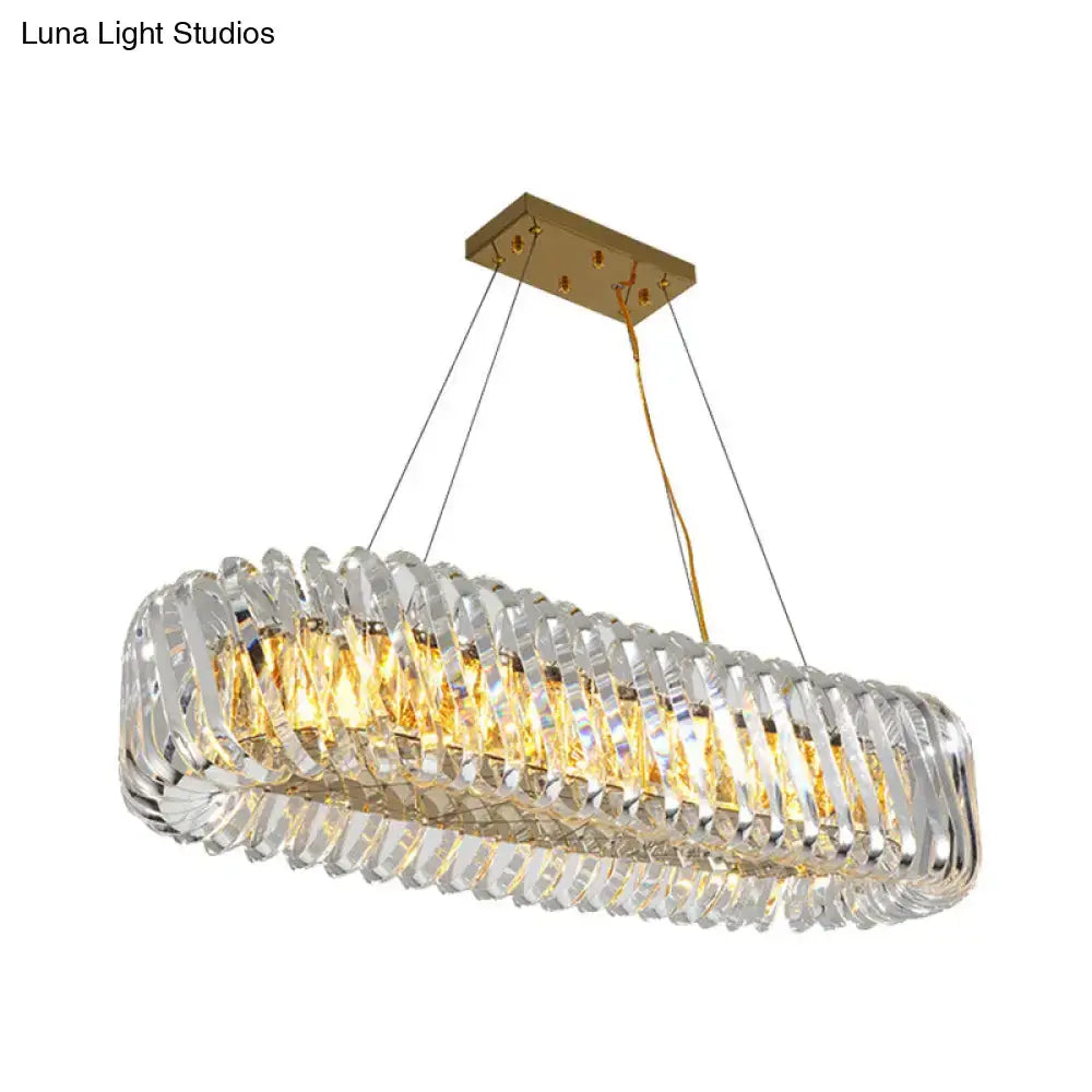 Modern gold and clear crystal oval pendant light for dining room