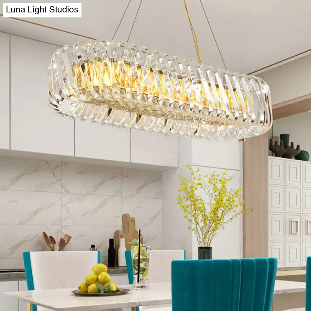 Modern gold and clear crystal oval pendant light for dining room