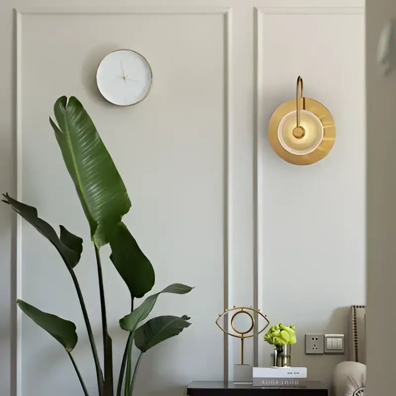 Modern gold and green glass wall sconce for bedroom lighting