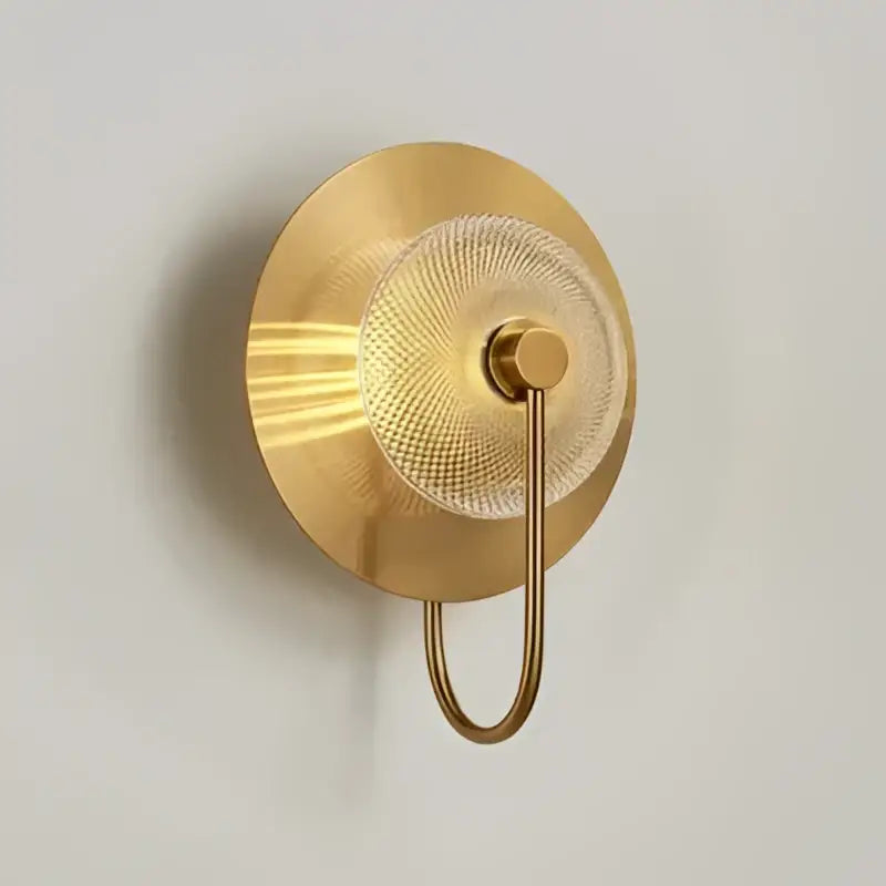 Modern gold and green glass wall sconce for bedroom lighting