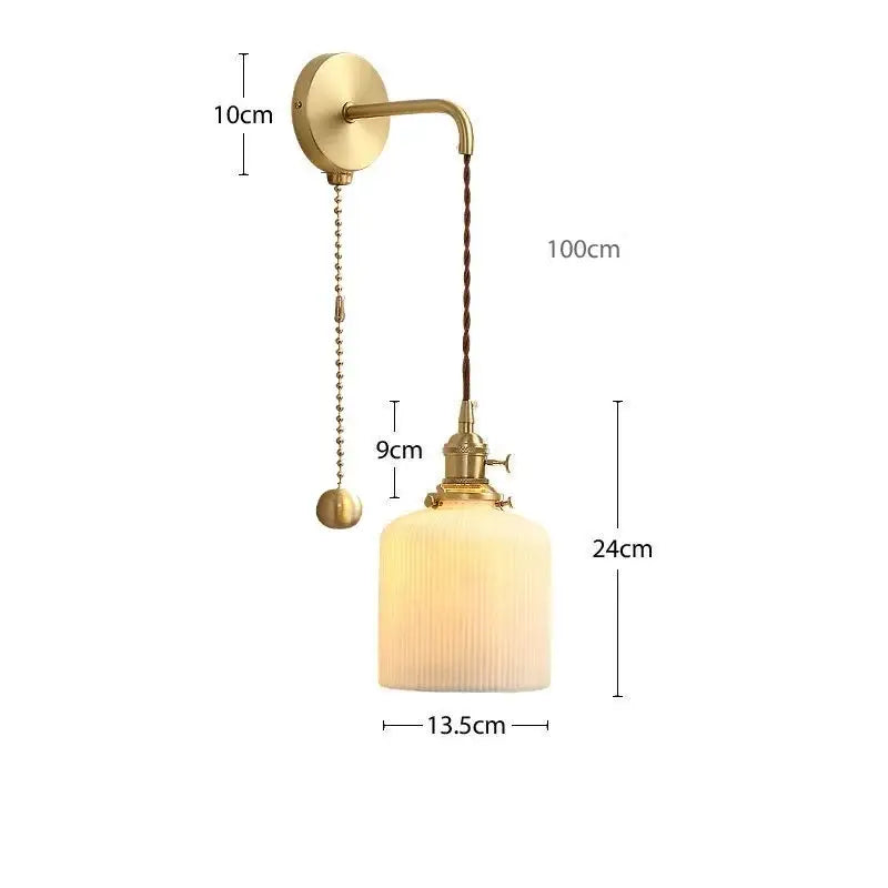 Modern gold ceramic wall lamp with ribbed shade for bedroom