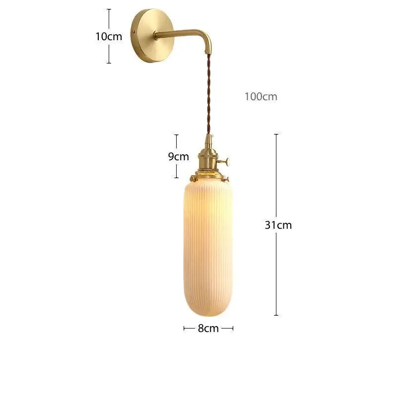 Modern gold ceramic wall lamp with ribbed shade for bedroom