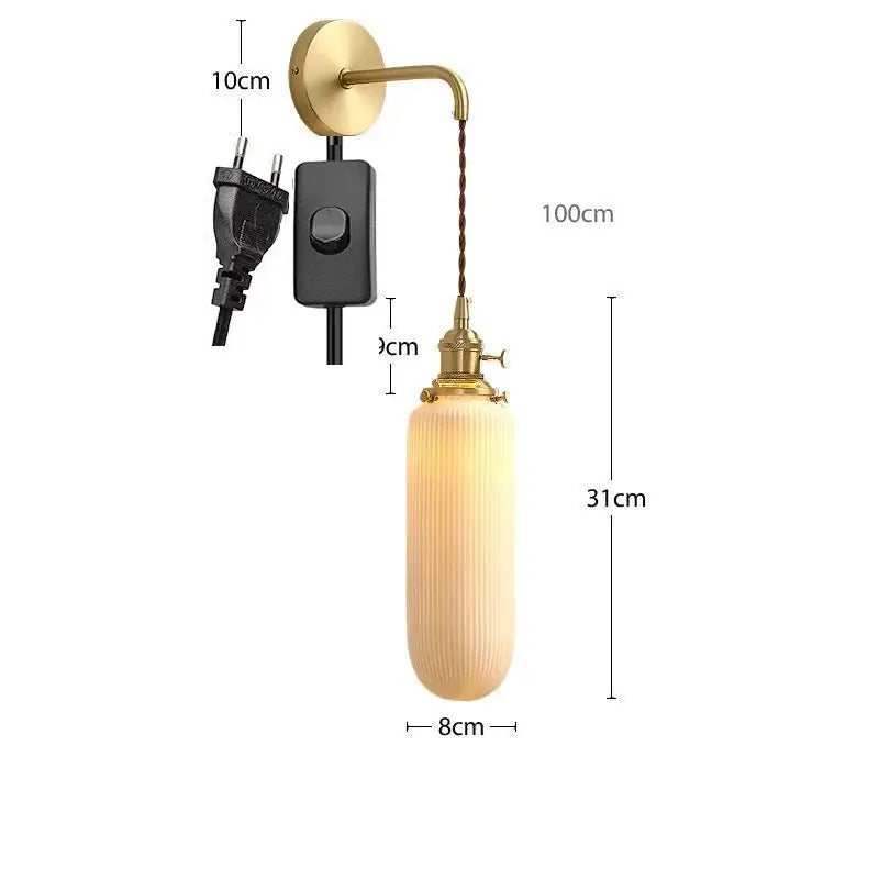 Modern gold ceramic wall lamp with ribbed shade for bedroom
