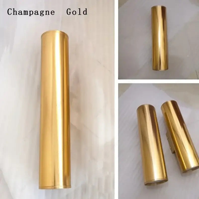 Modern gold cylindrical wall sconce light fixture living room