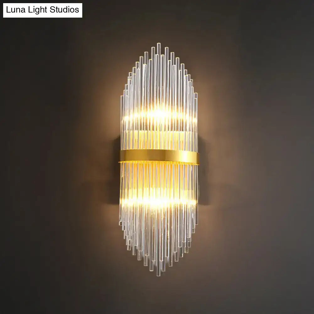 Modern gold flute shaped wall sconce with clear crystal rods bedroom