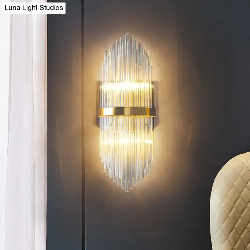 Modern gold flute shaped wall sconce with clear crystal rods bedroom