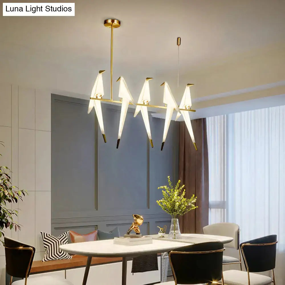 Modern gold origami bird pendant light for dining room decor