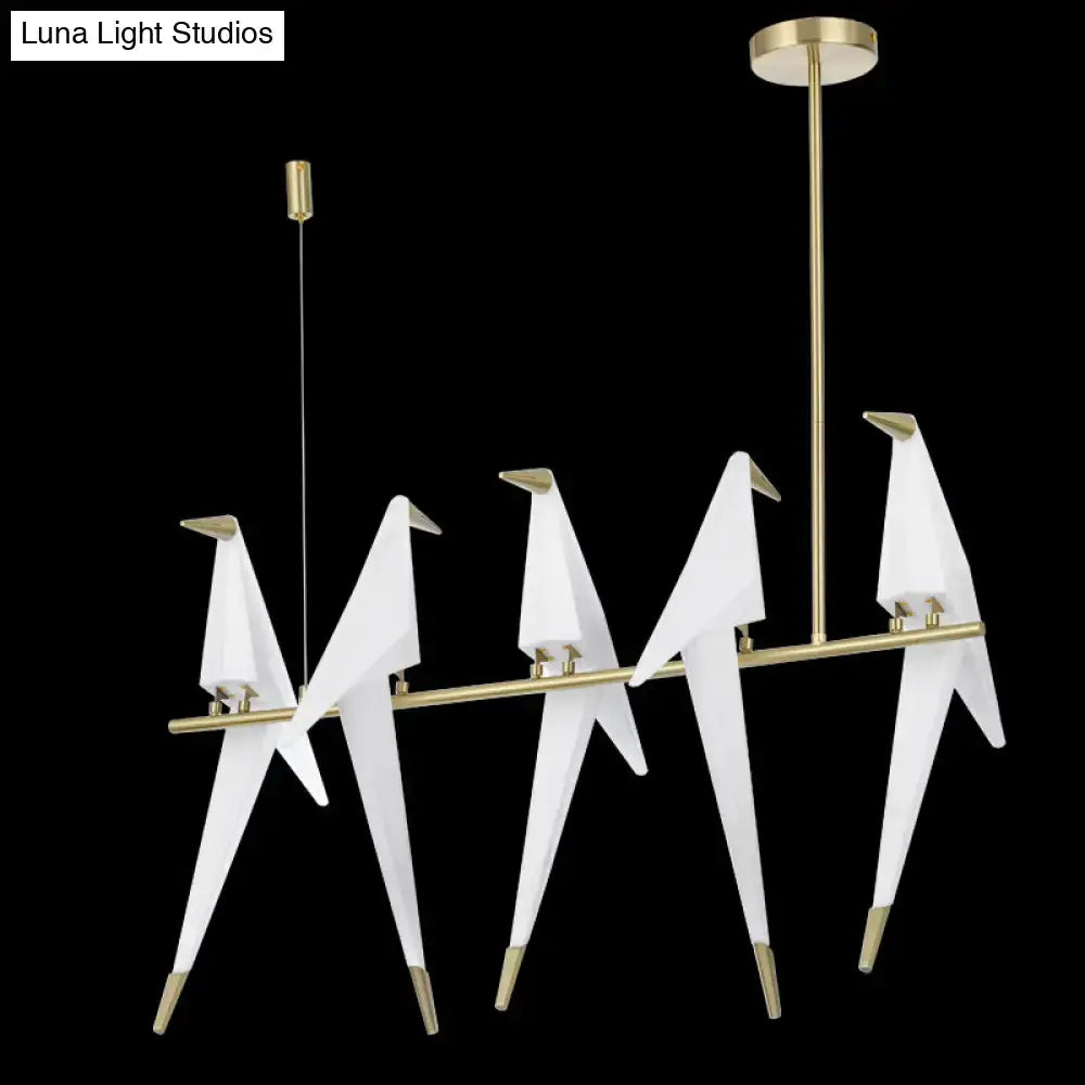 Modern gold origami bird pendant light for dining room decor