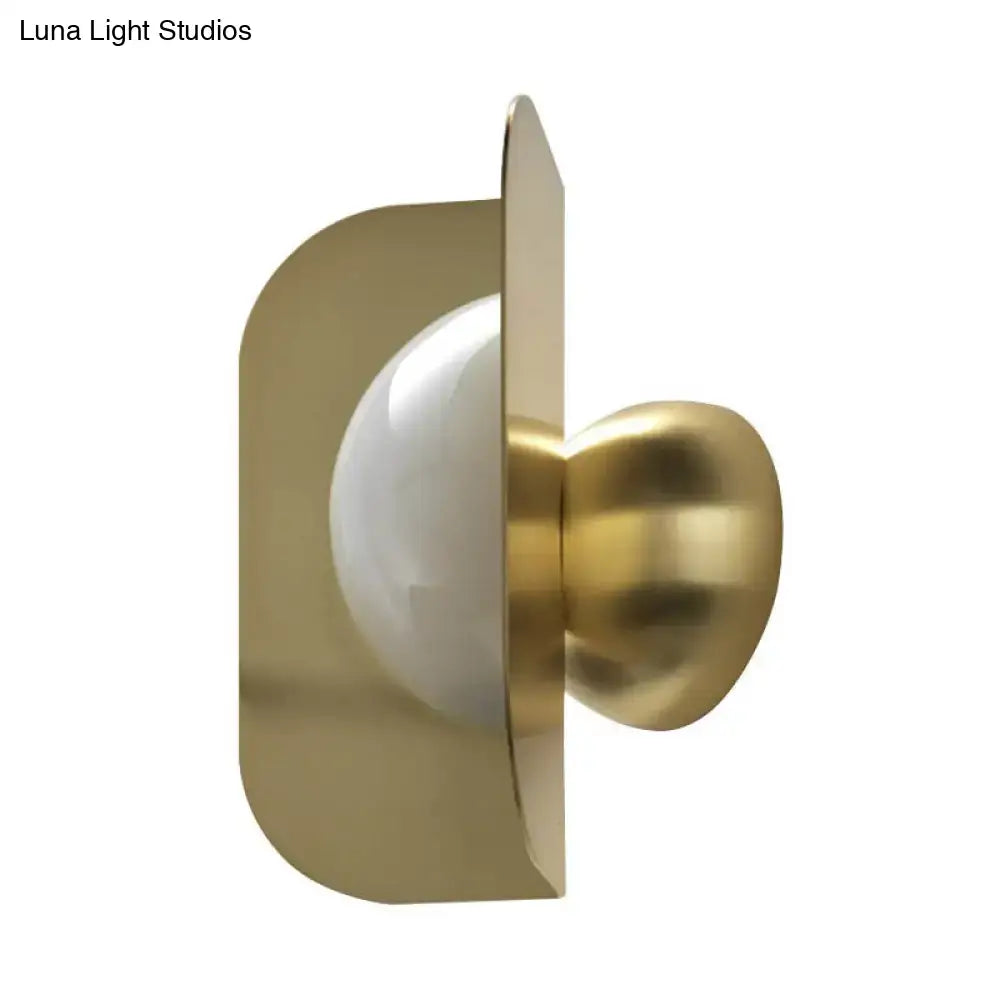 Modern gold sconce light with curved metal shade bedroom lamp