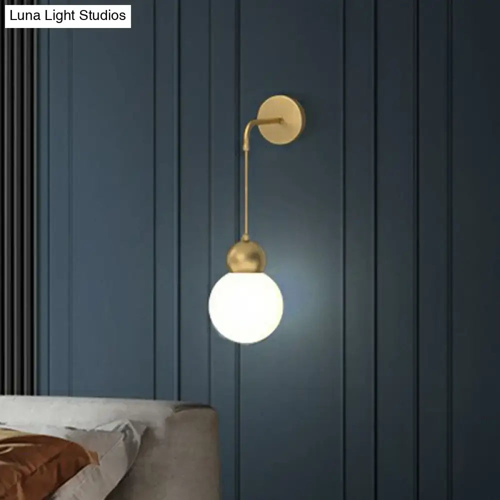 Modern gold sconce light with milky glass – bedroom wall lamp