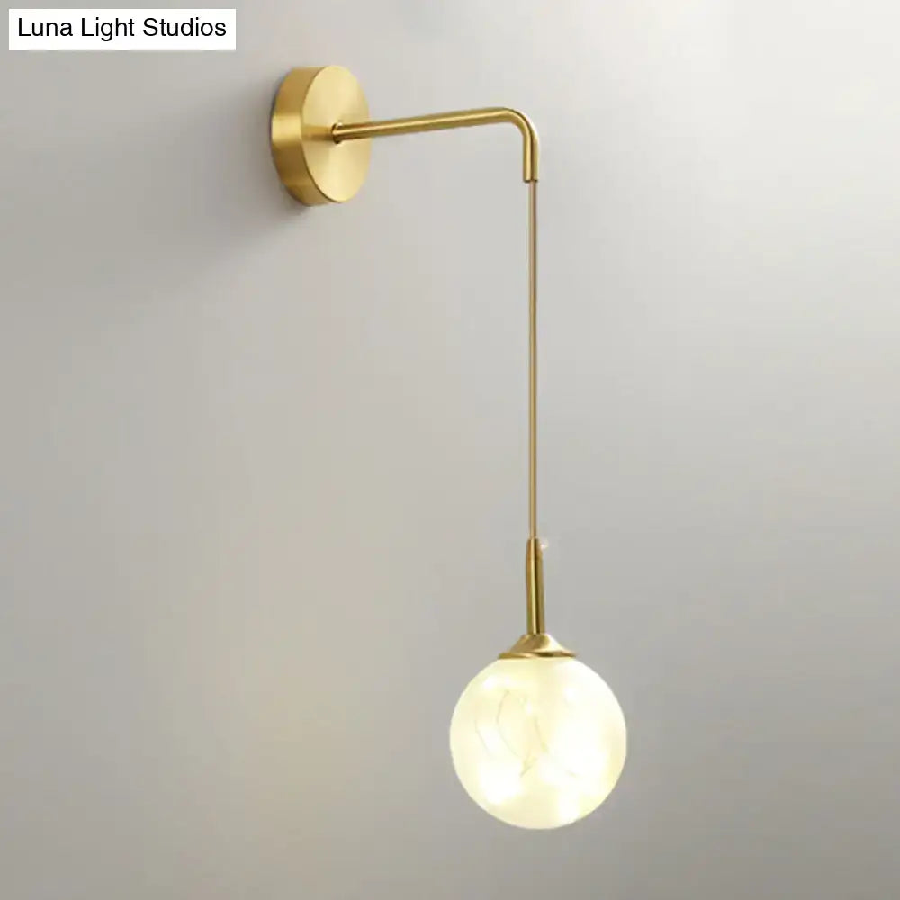 Modern gold wall lamp with frosted glass shade bedroom sconce