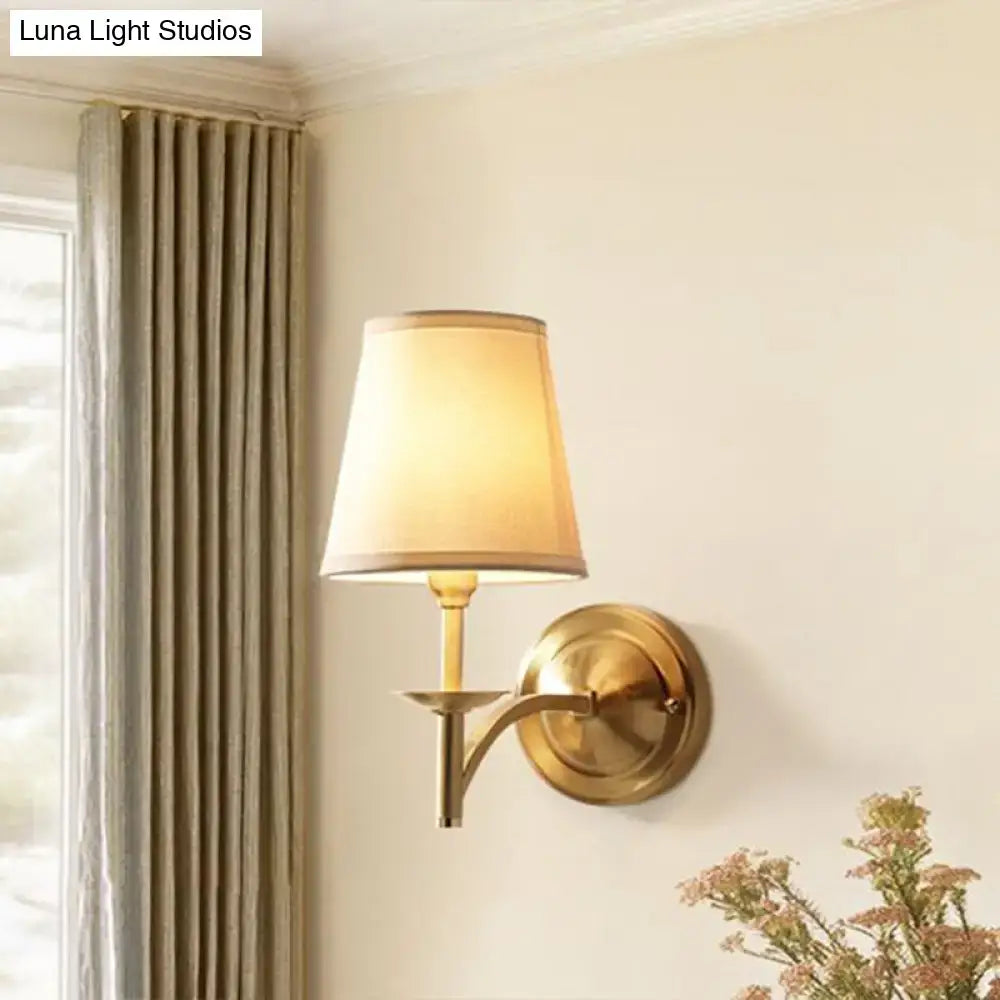 Modern gold wall light with fabric shade bedroom sconce