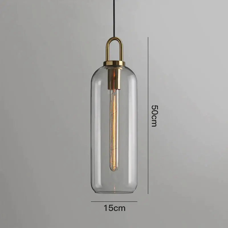 Modern gray glass ball pendant lights – dining room brass accents