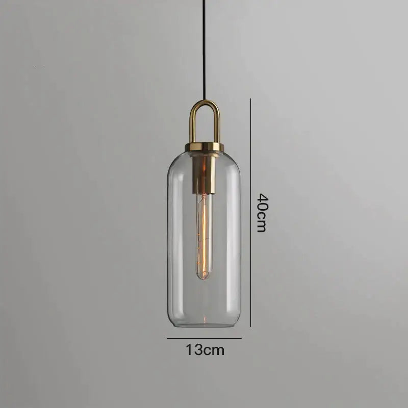 Modern gray glass ball pendant lights – dining room brass accents