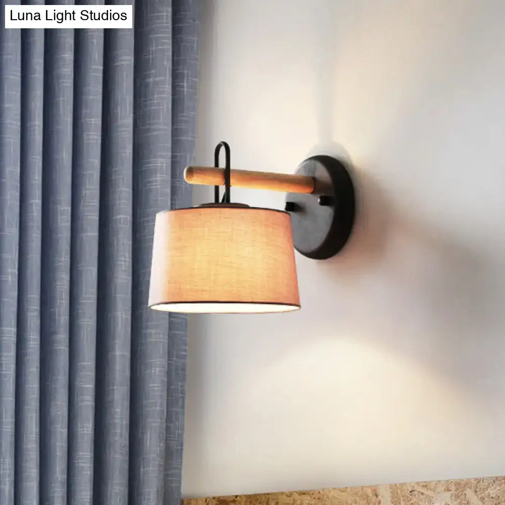 Modern grey drum shade wall lamp with wood arm for bedroom lighting