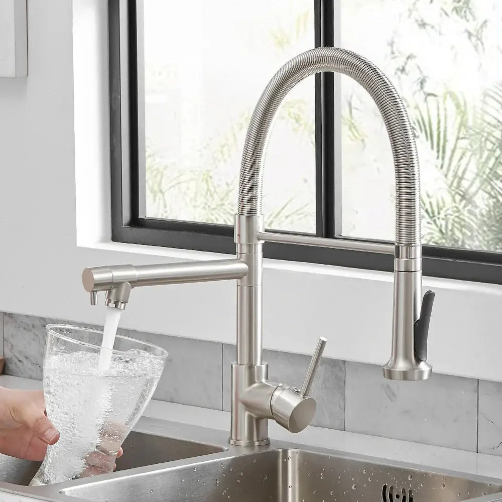 Modern matte black and brushed nickel spring kitchen faucet