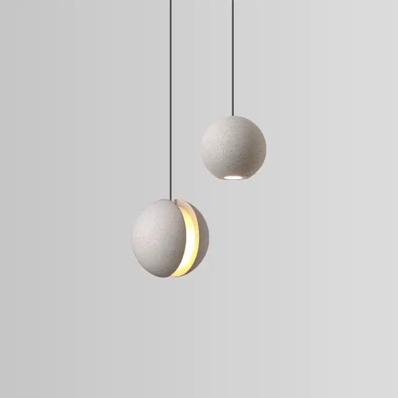 Modern minimalist gray and gold pendant light dining room