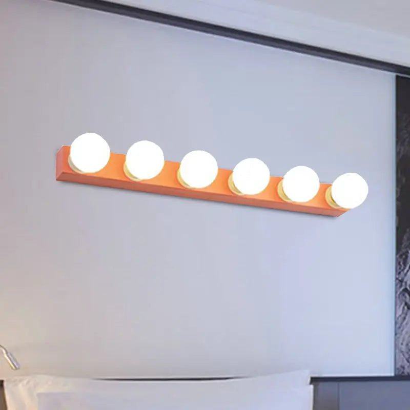 Modern orange & white 3 bulb vanity light fixture for bedroom
