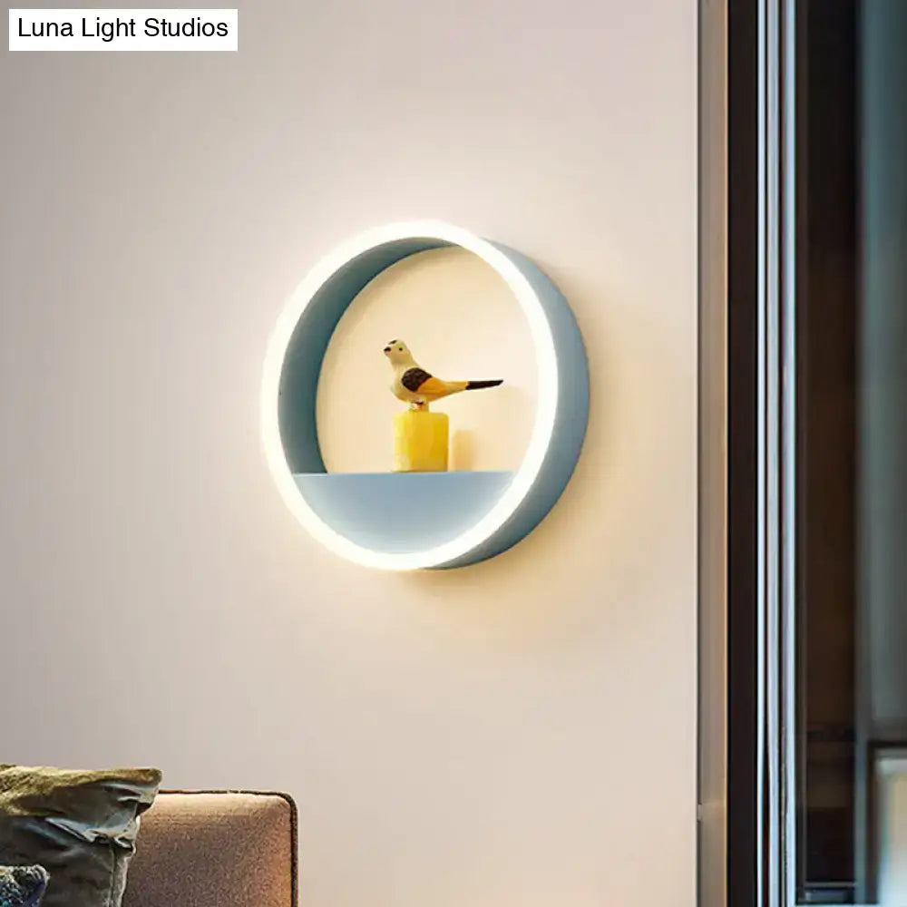 Modern pink & blue iron hoop wall light with bedroom storage rack
