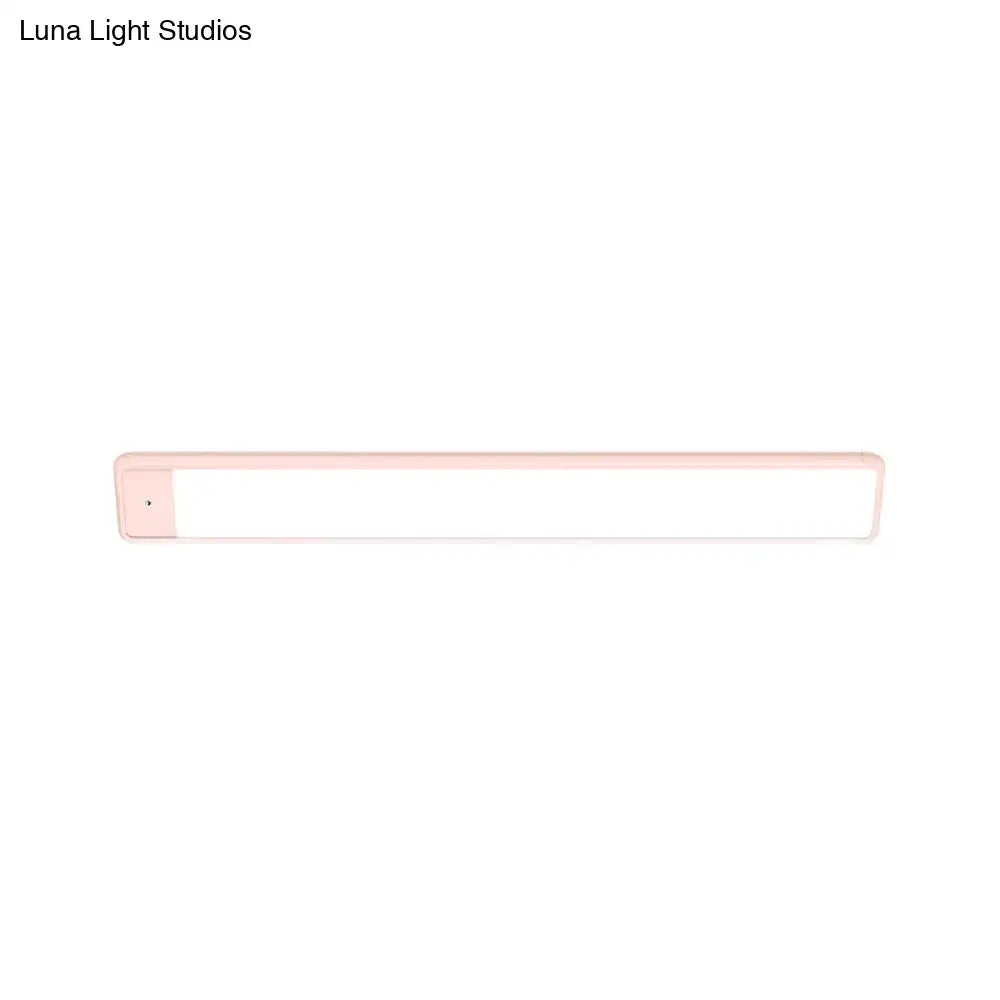 Modern pink elongated vanity lighting fixture for bedroom
