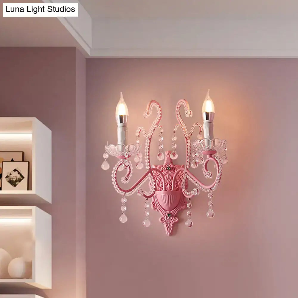 Modern pink metallic scroll arm wall lamp with crystal bedroom sconce