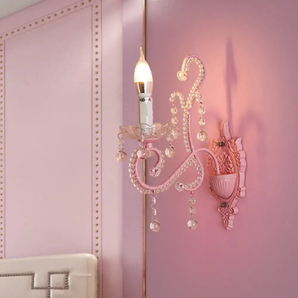 Modern pink metallic scroll arm wall lamp with crystal bedroom sconce