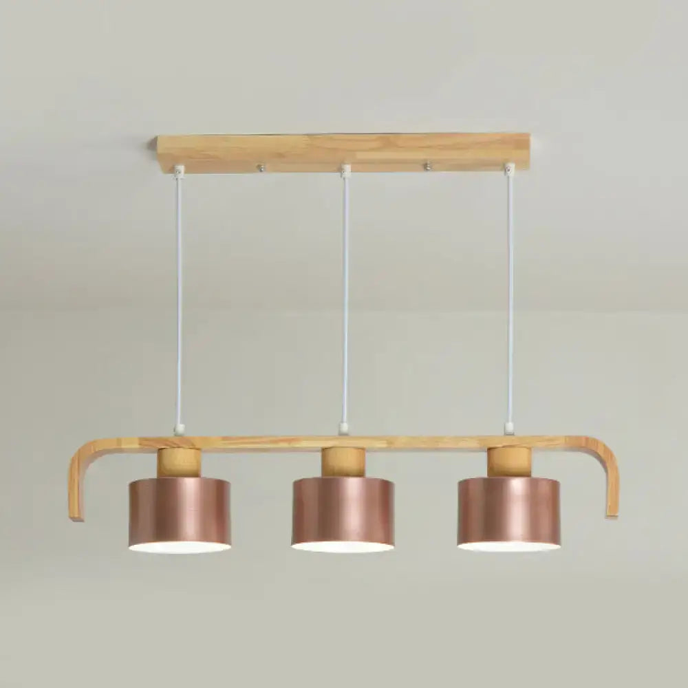 Modern rose gold drum island chandelier with wood dining room light