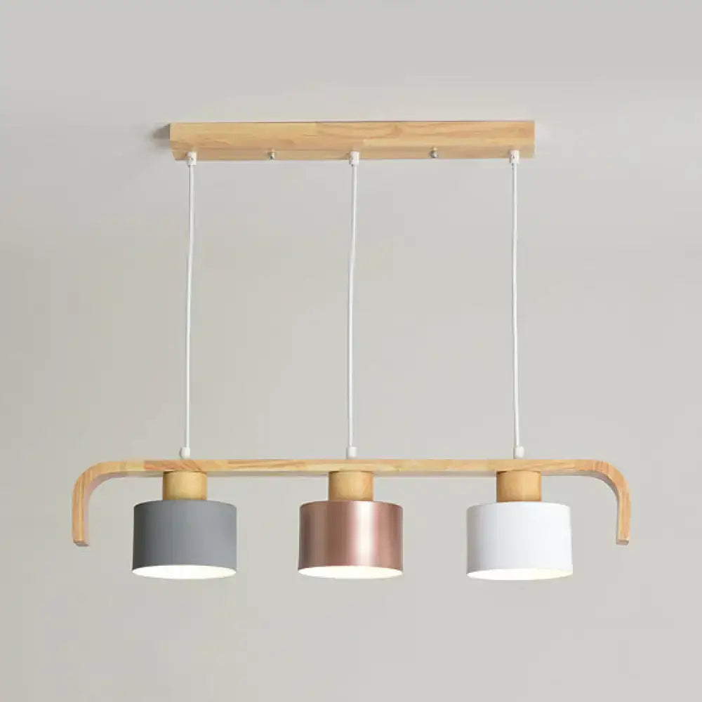 Modern rose gold drum island chandelier with wood dining room light