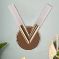 Modern rose gold v-shaped bedroom sconce with white glass shade