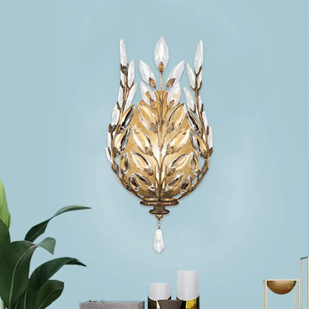 Modern silver & brass laurel wall light with crystal drop bedroom