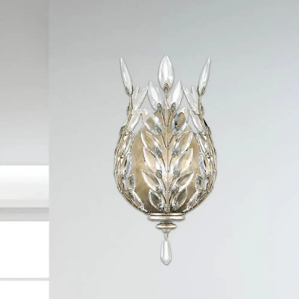 Modern silver & brass laurel wall light with crystal drop bedroom