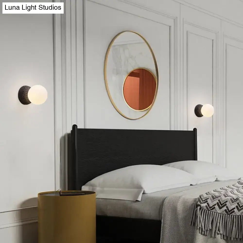 Modern volcanic stone and white glass wall lamp living room