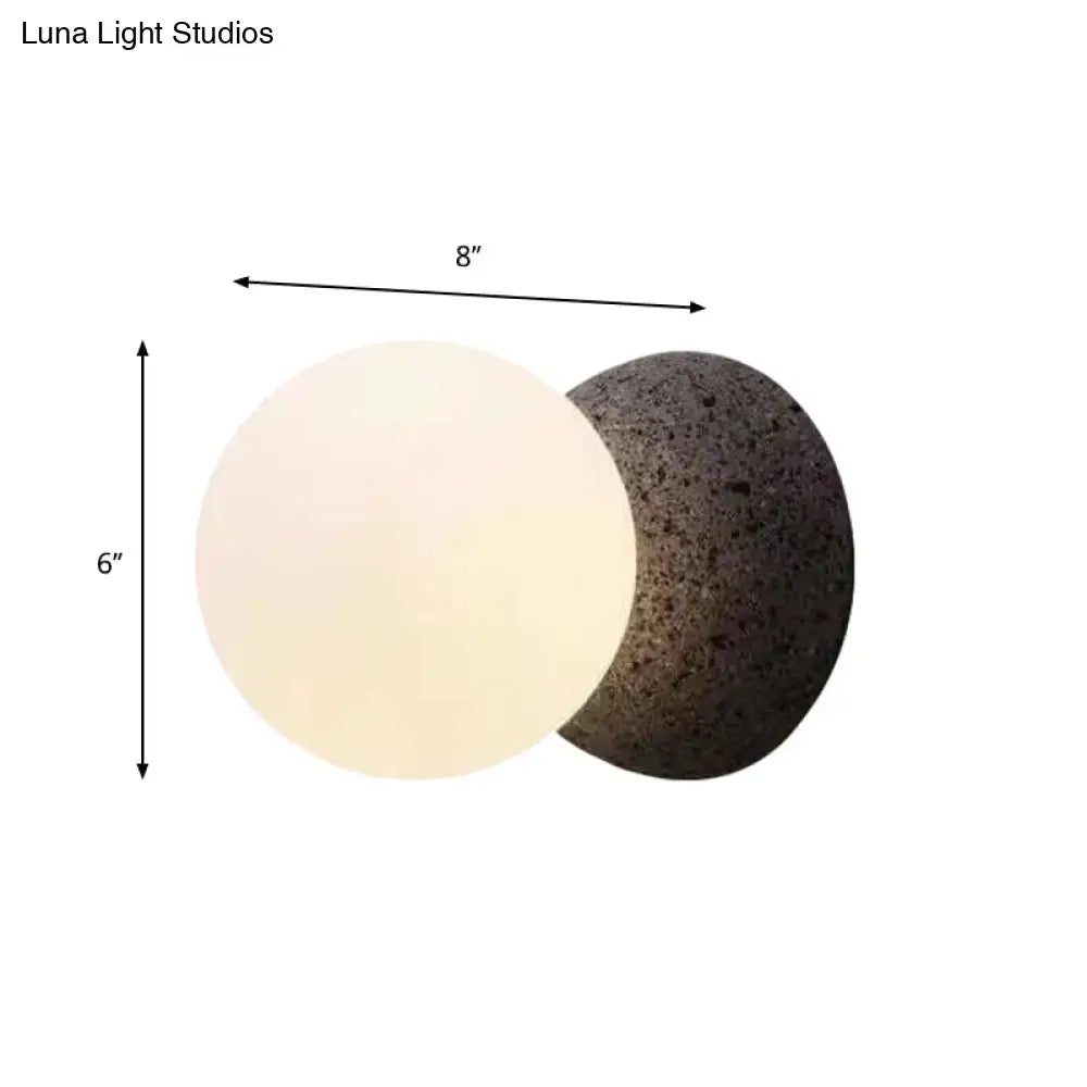 Modern volcanic stone and white glass wall lamp living room