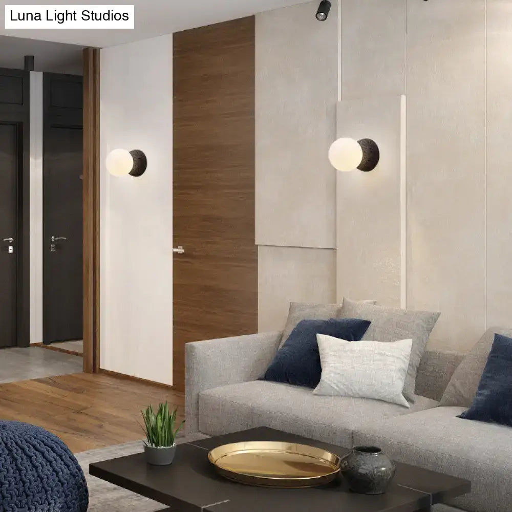 Modern volcanic stone and white glass wall lamp living room