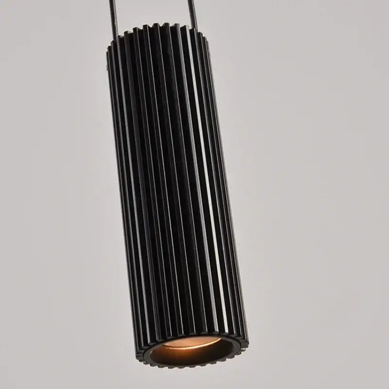 Modern white and black circular pendant light dining room tiered design