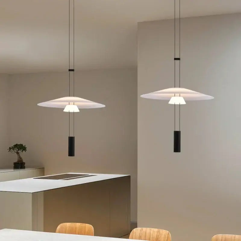 Modern white and black circular pendant light dining room tiered design