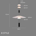 Modern white and black circular pendant light dining room tiered design