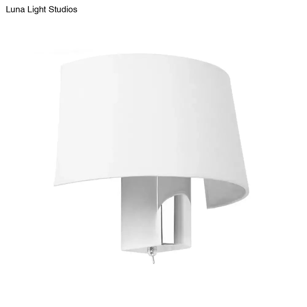 Modern white fabric sconce – bedroom wall lighting idea
