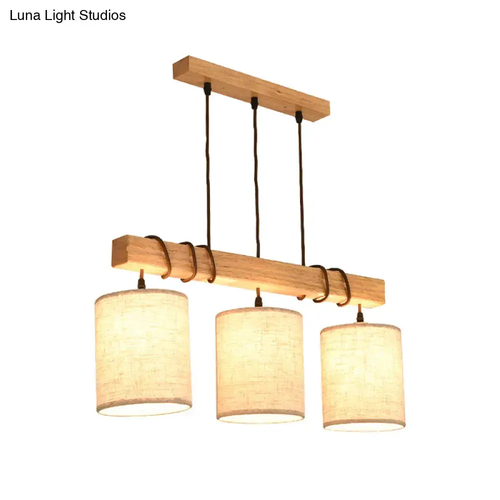 Modern wood and beige fabric island lighting fixture dining room