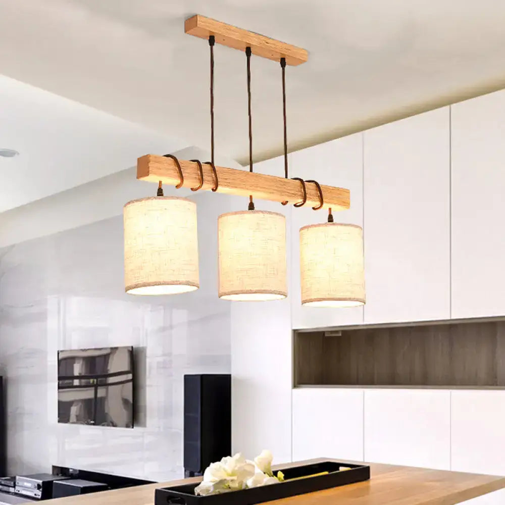 Modern wood and beige fabric island lighting fixture dining room