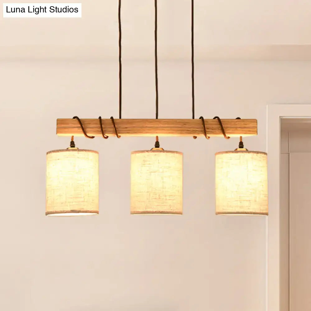 Modern wood and beige fabric island lighting fixture dining room