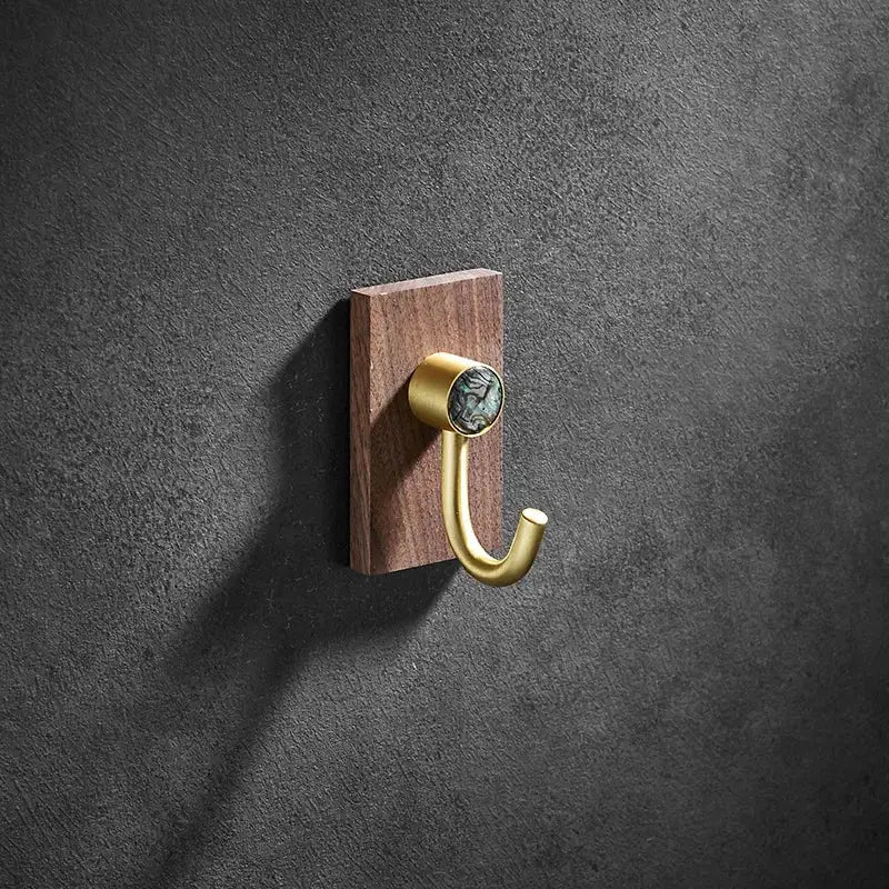 Modern wood and brushed gold wall hook row for kitchen