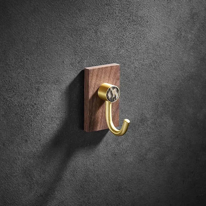 Modern wood and brushed gold wall hook row for kitchen