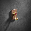 Modern wood and brushed gold wall hook row for kitchen